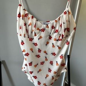 Princess Polly flower bodysuit. Never worn! Very cute